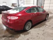 ✅ 2016 Ford Fusion Titanium • VIN: 3FA6P0K90GR319156 • Lot: 43598197. Listed on IAAI with 180,850 mi. Free auction sales archive from the USA and detailed vehicle history report at DreamBid. Image 4.