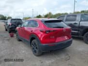 ✅ 2021 Mazda CX-30 Premium • VIN: 3MVDMBDY3MM241019 • Lot: 43429090. Listed on IAAI with 46,889 mi. Free auction sales archive from the USA and detailed vehicle history report at DreamBid. Image 3.