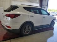 ✅ 2017 Hyundai Santa Fe 2.4L • VIN: 5NMZUDLB8HH010965 • Лот: 65143874. Опубликован ранее на Copart с пробегом 74 773 миль. Бесплатный доступ к архиву аукционных продаж из США и подробный отчёт об истории автомобиля на DreamBid. Изображение 3.