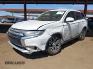 ✅ 2018 Mitsubishi Outlander SE • VIN: JA4AD3A33JZ040194 • Lot: 43240455. Listed on IAAI with 128,449 mi. Free auction sales archive from the USA and detailed vehicle history report at DreamBid. Image 17.