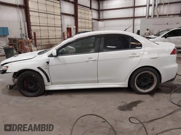✅ 2013 Mitsubishi Lancer Evolution MR • VIN: JA32W5FV0DU010032 • Lot: 42592361. Wystawiony na IAAI z przebiegiem 133 344 mil. Bezpłatny archiwum sprzedaży aukcyjnych z USA i szczegółowy raport historii pojazdu na DreamBid. Zdjęcie 14.