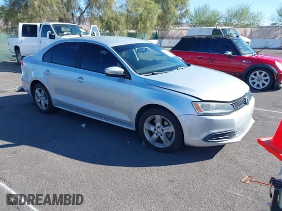 ✅ 2012 Volkswagen Jetta TDI • VIN: 3VW3L7AJ6CM031305 • Lot: 43498165. Listed on IAAI with 105,579 mi. Free auction sales archive from the USA and detailed vehicle history report at DreamBid. Image 1.
