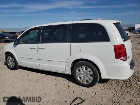 2014 Dodge Grand Caravan SE with VIN 2C4RDGBG3ER174334, listed as a Copart auction lot 90400355 with 209,004 mi miles and Clean title. Bid and sale history available at DreamBid. Image 2.