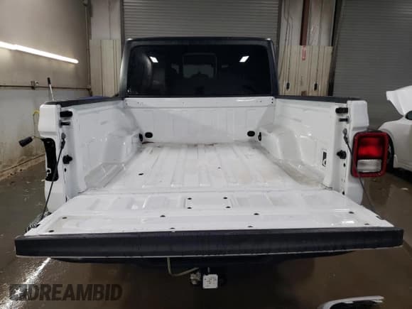 ✅ 2023 Jeep Gladiator Sport • VIN: 1C6HJTAG3PL571060 • Lot: 46112255. Listed on Copart with 23,352 mi. Free auction sales archive from the USA and detailed vehicle history report at DreamBid. Image 6.