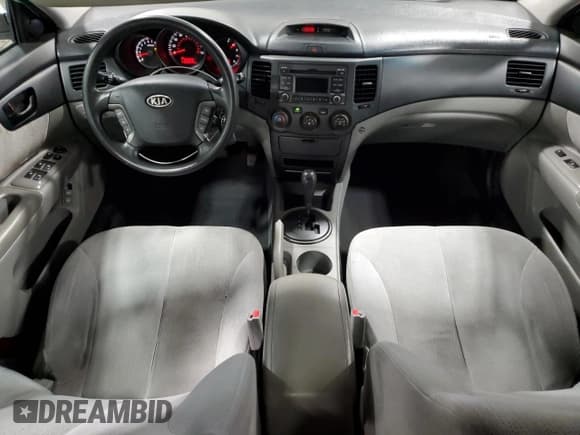 ✅ 2009 Kia Optima LX • VIN: KNAGE228695350941 • Lot: 85725235. Listed on Copart with 209,973 mi. Free auction sales archive from the USA and detailed vehicle history report at DreamBid. Image 8.