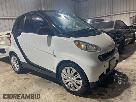 ✅ 2012 Smart fortwo Pure • VIN: WMEEJ3BA5CK540092 • Lot: 94611465. Wystawiony na Copart z przebiegiem 59 356 mil. Bezpłatny archiwum sprzedaży aukcyjnych z USA i szczegółowy raport historii pojazdu na DreamBid. Zdjęcie 1.
