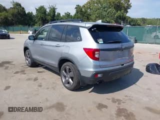 ✅ 2021 Honda Passport Touring • VIN: 5FNYF8H95MB040164 • Lot: 43274621. Wystawiony na IAAI z przebiegiem 125 665 mil. Bezpłatny archiwum sprzedaży aukcyjnych z USA i szczegółowy raport historii pojazdu na DreamBid. Zdjęcie 3.
