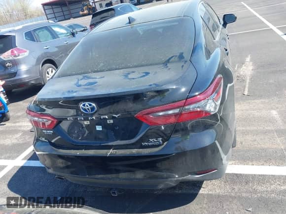 2022 Toyota Camry Hybrid XLE with VIN 4T1F31AK5NU594457, listed as a IAAI auction lot 41884438 with 69,767 mi miles and . Bid and sale history available at DreamBid. Image 16.