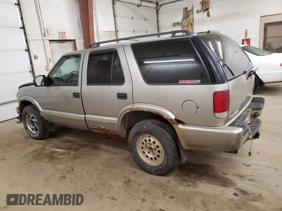 2004 Chevrolet Blazer LS with VIN 1GNDT13X04K101564, listed as a Copart auction lot 80160164 with 249,187 mi miles and Salvage title. Bid and sale history available at DreamBid. Image 2.