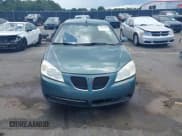 ✅ 2009 Pontiac G6 1SB • VIN: 1G2ZJ57K594255438 • Лот: 42469358. Опубликован ранее на IAAI с пробегом 271 832 миль. Бесплатный доступ к архиву аукционных продаж из США и подробный отчёт об истории автомобиля на DreamBid. Изображение 11.
