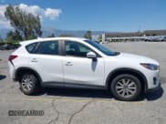 ✅ 2016 Mazda CX-5 Sport • VIN: JM3KE2BY5G0793032 • Lot: 42128706. Listed on IAAI with 52,010 mi. Free auction sales archive from the USA and detailed vehicle history report at DreamBid. Image 13.
