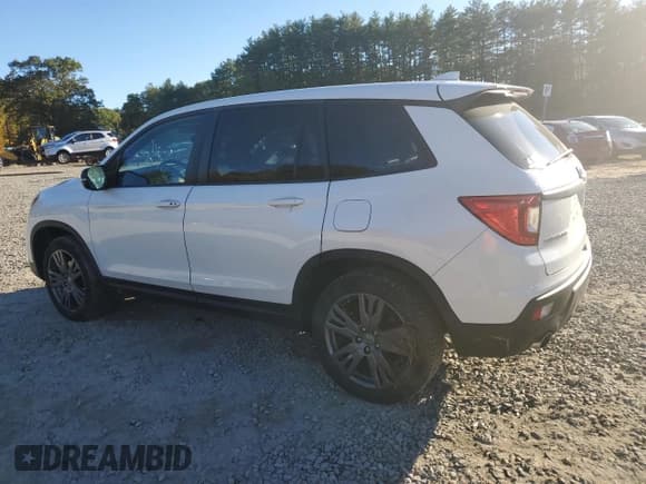 ✅ 2021 Honda Passport EX-L • VIN: 5FNYF8H55MB021921 • Лот: 87118205. Опубликован ранее на Copart с пробегом 99 750 миль. Бесплатный доступ к архиву аукционных продаж из США и подробный отчёт об истории автомобиля на DreamBid. Изображение 2.