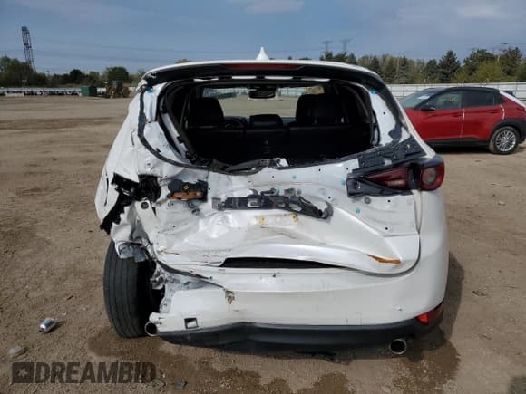 ✅ 2021 Mazda CX-5 Touring • VIN: JM3KFBCM9M1492438 • Lot: 86594165. Wystawiony na Copart z przebiegiem 94 049 mil. Bezpłatny archiwum sprzedaży aukcyjnych z USA i szczegółowy raport historii pojazdu na DreamBid. Zdjęcie 6.