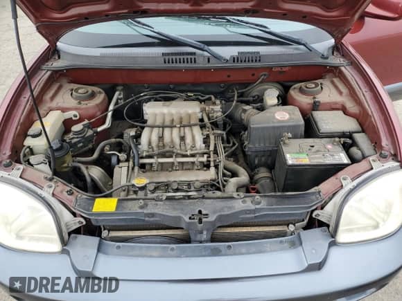 2002 Hyundai Santa Fe GLS z VIN KM8SC13D02U173092, wystawiony jako Copart lot #87683115 z przebiegiem 96 950 mil mil oraz Szkoda całkowita • Salvage title. Historia ofert i sprzedaży dostępna na DreamBid. Obrazek 12.