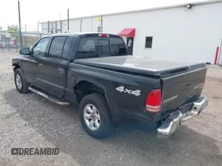 ✅ 2004 Dodge Dakota SLT • VIN: 1D7HG48N54S664848 • Lot: 42152635. Wystawiony na IAAI z przebiegiem 153 824 mil. Bezpłatny archiwum sprzedaży aukcyjnych z USA i szczegółowy raport historii pojazdu na DreamBid. Zdjęcie 3.