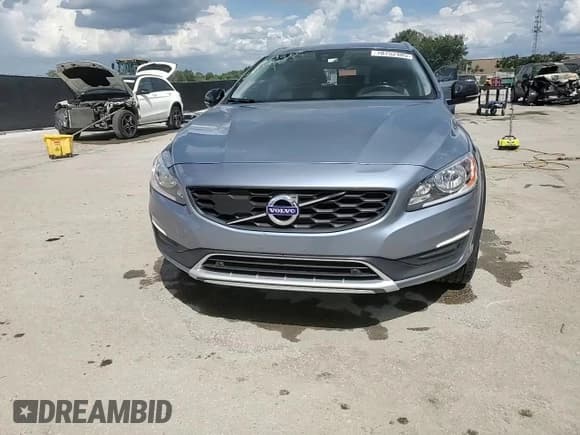 ✅ 2018 Volvo V60 • VIN: YV440MWK5J2055175 • Лот: 70752405. Опубликован ранее на Copart с пробегом 58 992 миль. Бесплатный доступ к архиву аукционных продаж из США и подробный отчёт об истории автомобиля на DreamBid. Изображение 14.