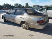 ✅ 1995 Toyota Camry LE • VIN: JT2SK12E7S0273689 • Лот: 43799874. Опубликован ранее на IAAI с пробегом 154 750 миль. Бесплатный доступ к архиву аукционных продаж из США и подробный отчёт об истории автомобиля на DreamBid. Изображение 3.