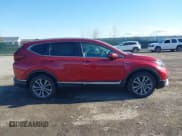 ✅ 2021 Honda CR-V Touring • VIN: 7FART6H9XME003424 • Lot: 42030168. Listed on IAAI with 86,299 mi. Free auction sales archive from the USA and detailed vehicle history report at DreamBid. Image 13.