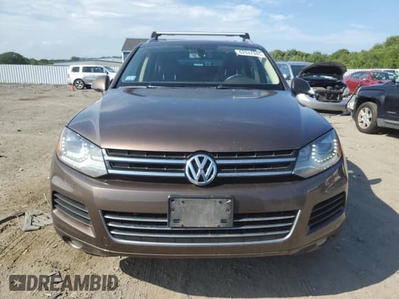 ✅ 2013 Volkswagen Touareg Lux • VIN: WVGEF9BP6DD013932 • Lot: 62047945. Listed on Copart with 127,821 mi. Free auction sales archive from the USA and detailed vehicle history report at DreamBid. Image 5.
