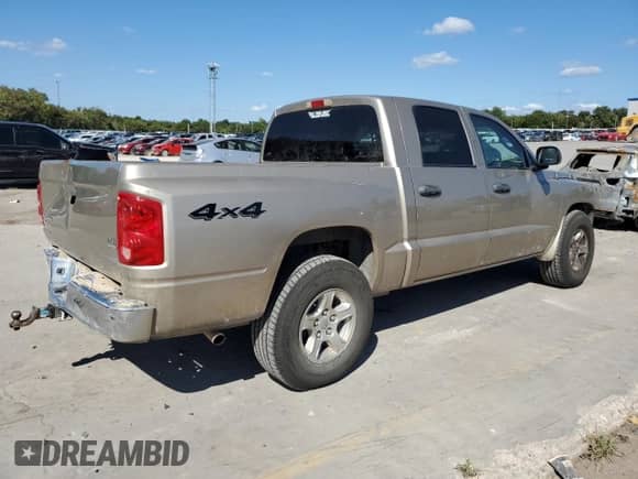 2005 Dodge Dakota SLT with VIN 1D7HW48N15S260885, listed as a Copart auction lot 71652084 with 189,214 mi miles and Salvage title. Bid and sale history available at DreamBid. Image 3.