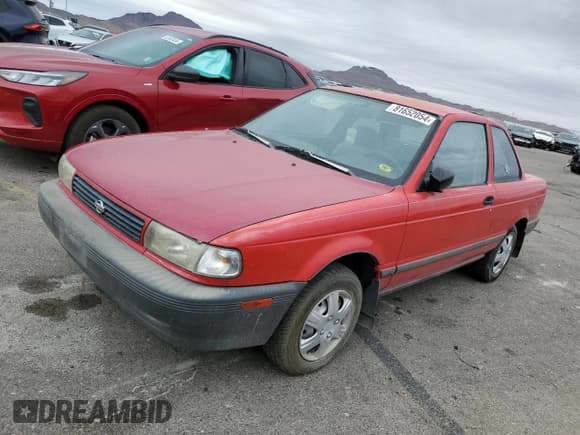 ✅ 1993 Nissan Sentra E • VIN: 1N4EB32A0PC795203 • Lot: 81652054. Listed on Copart with 106,179 mi. Free auction sales archive from the USA and detailed vehicle history report at DreamBid. Image 1.