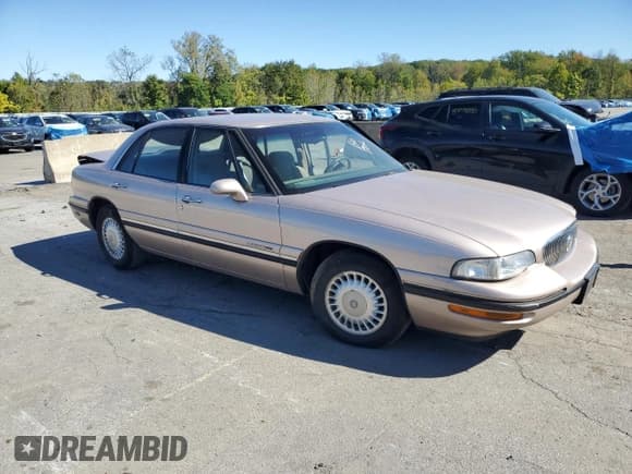 ✅ 1998 Buick LeSabre Custom • VIN: 1G4HP52K8WH506644 • Lot: 80672675. Listed on Copart with 72,099 mi. Free auction sales archive from the USA and detailed vehicle history report at DreamBid. Image 4.