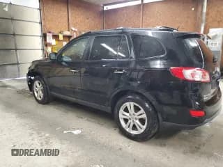 ✅ 2012 Hyundai Santa Fe Limited • VIN: 5XYZKDAG9CG121614 • Lot: 83969704. Listed on Copart with 119,067 mi. Free auction sales archive from the USA and detailed vehicle history report at DreamBid. Image 2.