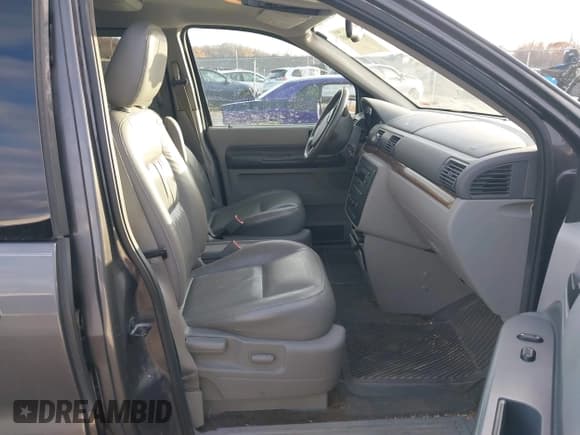 ✅ 2005 Ford Freestar SEL • VIN: 2FMZA52205BA31296 • Lot: 43780603. Listed on IAAI with 249,335 mi. Free auction sales archive from the USA and detailed vehicle history report at DreamBid. Image 5.