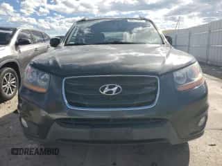 2011 Hyundai Santa Fe Limited z VIN 5XYZKDAG8BG061887, wystawiony jako Copart lot #68511294 z przebiegiem 176 337 mil mil oraz Szkoda całkowita • Salvage title. Historia ofert i sprzedaży dostępna na DreamBid. Obrazek 5.