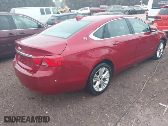 ✅ 2015 Chevrolet Impala LT • VIN: 2G1125S39F9180928 • Lot: 43713191. Listed on IAAI with 239,139 mi. Free auction sales archive from the USA and detailed vehicle history report at DreamBid. Image 4.