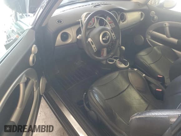 ✅ 2003 MINI Hardtop • VIN: WMWRC33463TE17964 • Lot: 67010715. Listed on Copart with 88,753 mi. Free auction sales archive from the USA and detailed vehicle history report at DreamBid. Image 8.