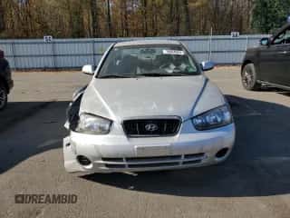 2001 Hyundai Elantra GLS z VIN KMHDN45D71U057338, wystawiony jako Copart lot #79084024 z przebiegiem 137 887 mil mil oraz Szkoda całkowita • Salvage title. Historia ofert i sprzedaży dostępna na DreamBid. Obrazek 5.