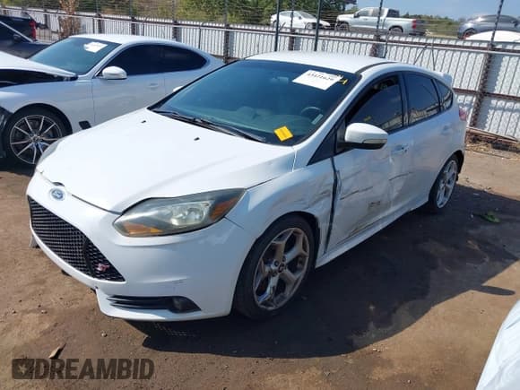 ✅ 2014 Ford Focus ST • VIN: 1FADP3L93EL212394 • Lot: 43421629. Listed on IAAI with 149,068 mi. Free auction sales archive from the USA and detailed vehicle history report at DreamBid. Image 2.