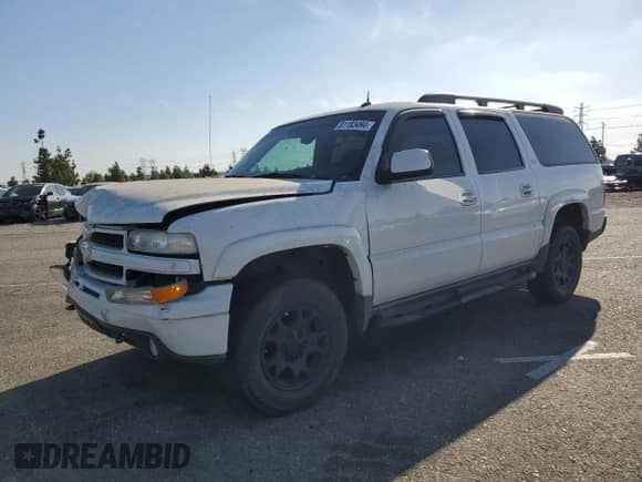 2004 Chevrolet Suburban Z71 z VIN 3GNFK16T34G158613, wystawiony jako Copart lot #81183494 z przebiegiem 131 876 mil mil oraz Szkoda całkowita • Salvage title. Historia ofert i sprzedaży dostępna na DreamBid. Obrazek 1.