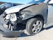 ✅ 2004 Toyota Corolla CE • VIN: 1NXBR32E14Z203918 • Lot: 43013302. Listed on IAAI with 244,429 mi. Free auction sales archive from the USA and detailed vehicle history report at DreamBid. Image 6.