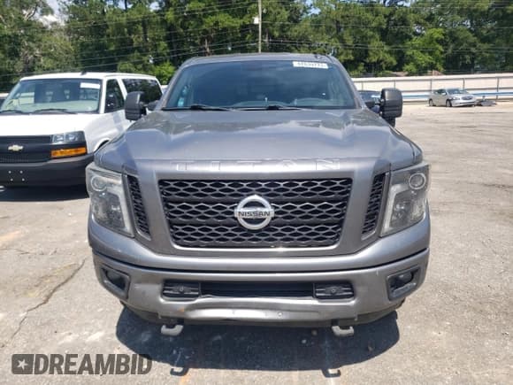 ✅ 2018 Nissan Titan Platinum Reserve • VIN: 1N6BA1F40JN516351 • Lot: 62639775. Listed on Copart with 118,178 mi. Free auction sales archive from the USA and detailed vehicle history report at DreamBid. Image 5.