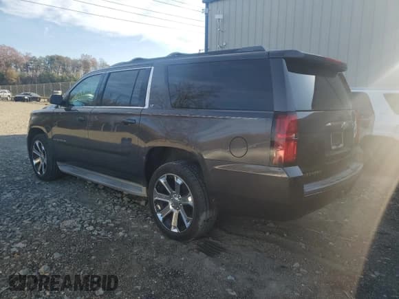 ✅ 2015 Chevrolet Suburban LT • VIN: 1GNSKJKC7FR195218 • Lot: 92090005. Listed on Copart with 257,730 mi. Free auction sales archive from the USA and detailed vehicle history report at DreamBid. Image 2.