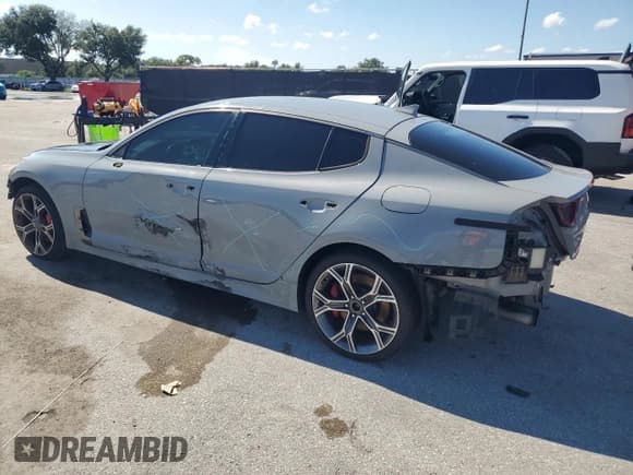 ✅ 2021 Kia Stinger GT • VIN: KNAE35LC2M6093152 • Лот: 69081285. Опубликован ранее на Copart с пробегом 82 472 миль. Бесплатный доступ к архиву аукционных продаж из США и подробный отчёт об истории автомобиля на DreamBid. Изображение 2.