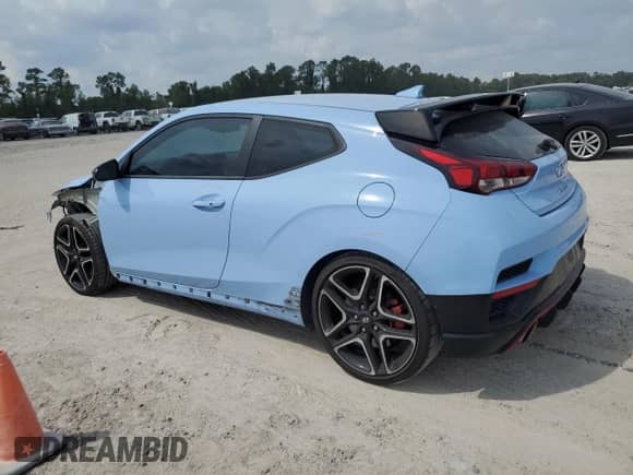 2022 Hyundai Veloster z VIN KMHT36AH7NU013397, wystawiony jako Copart lot #73109364 z przebiegiem 35 283 mil mil oraz Szkoda całkowita • Salvage title. Historia ofert i sprzedaży dostępna na DreamBid. Obrazek 2.