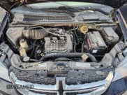 ✅ 2014 Dodge Grand Caravan SE • VIN: 2C4RDGBGXER105091 • Lot: 91052815. Listed on Copart with 168,330 mi. Free auction sales archive from the USA and detailed vehicle history report at DreamBid. Image 12.