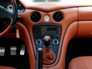 ✅ 2005 Maserati Coupe • VIN: ZAMBC38AX50016XXX • Lot: 71891615. Wystawiony na Copart z przebiegiem 40 333 mil. Bezpłatny archiwum sprzedaży aukcyjnych z USA i szczegółowy raport historii pojazdu na DreamBid. Zdjęcie 10.