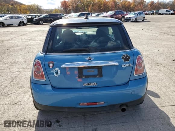 ✅ 2013 MINI Hardtop • VIN: WMWSU3C5XDT687477 • Lot: 91510225. Listed on Copart with 70,850 mi. Free auction sales archive from the USA and detailed vehicle history report at DreamBid. Image 6.