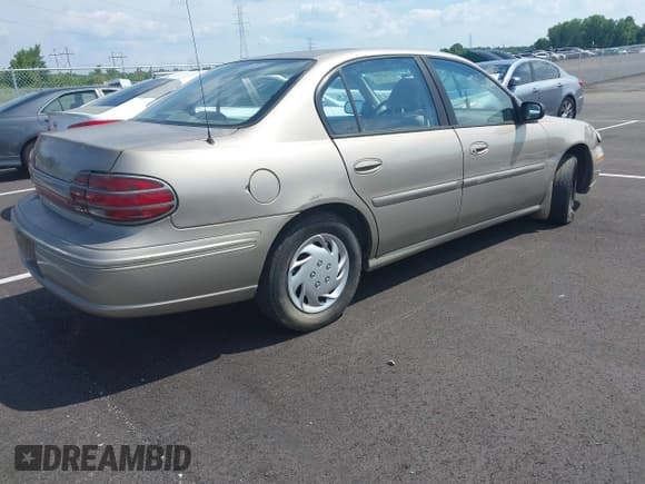 ✅ 1998 Oldsmobile Cutlass GL • VIN: 1G3NB52M9W6311834 • Lot: 42628801. Listed on IAAI with 192,417 mi. Free auction sales archive from the USA and detailed vehicle history report at DreamBid. Image 4.
