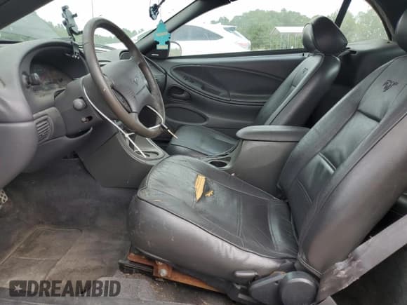 ✅ 2003 Ford Mustang Deluxe • VIN: 1FAFP44483F406478 • Lot: 71818815. Listed on Copart with 233,809 mi. Free auction sales archive from the USA and detailed vehicle history report at DreamBid. Image 7.