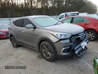 ✅ 2018 Hyundai Santa Fe 2.4L • VIN: 5XYZTDLB0JG562768 • Лот: 45202753. Опубликован ранее на Copart с пробегом Не указан. Бесплатный доступ к архиву аукционных продаж из США и подробный отчёт об истории автомобиля на DreamBid. Изображение 4.