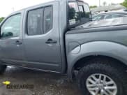 ✅ 2018 Nissan Frontier SV • VIN: 1N6AD0EV4JN726457 • Lot: 42348883. Listed on IAAI with 97,880 mi. Free auction sales archive from the USA and detailed vehicle history report at DreamBid. Image 14.