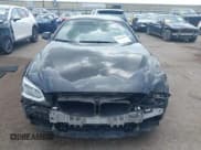 ✅ 2014 BMW 6 Series 650i • VIN: WBA6B2C51ED129160 • Lot: 42458210. Listed on IAAI with 95,339 mi. Free auction sales archive from the USA and detailed vehicle history report at DreamBid. Image 13.