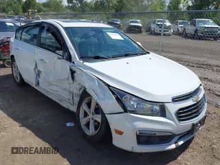 ✅ 2015 Chevrolet Cruze LT • VIN: 1G1PE5SB6F7162445 • Lot: 43086055. Listed on IAAI with 150,117 mi. Free auction sales archive from the USA and detailed vehicle history report at DreamBid. Image 1.