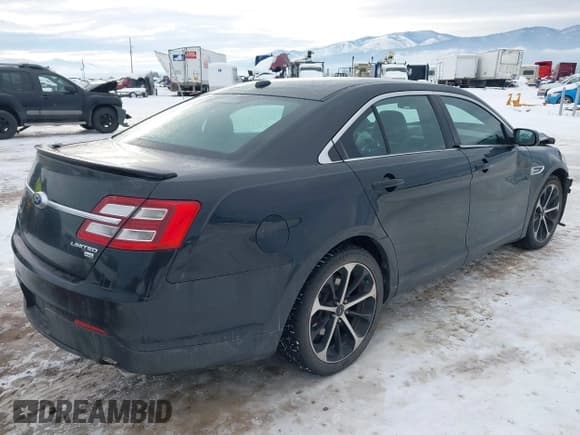 ✅ 2014 Ford Taurus Limited • VIN: 1FAHP2J88EG109972 • Lot: 41310254. Listed on IAAI with 143,757 mi. Free auction sales archive from the USA and detailed vehicle history report at DreamBid. Image 4.