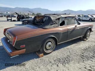 ✅ 1979 Rolls-Royce Flying Spur • VIN: DRK50087 • Lot: 65928224. Wystawiony na Copart z przebiegiem Nie podano. Bezpłatny archiwum sprzedaży aukcyjnych z USA i szczegółowy raport historii pojazdu na DreamBid. Zdjęcie 3.